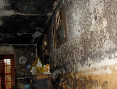 Large mold colonies have grown in this house, which was flooded when a water pipe burst 